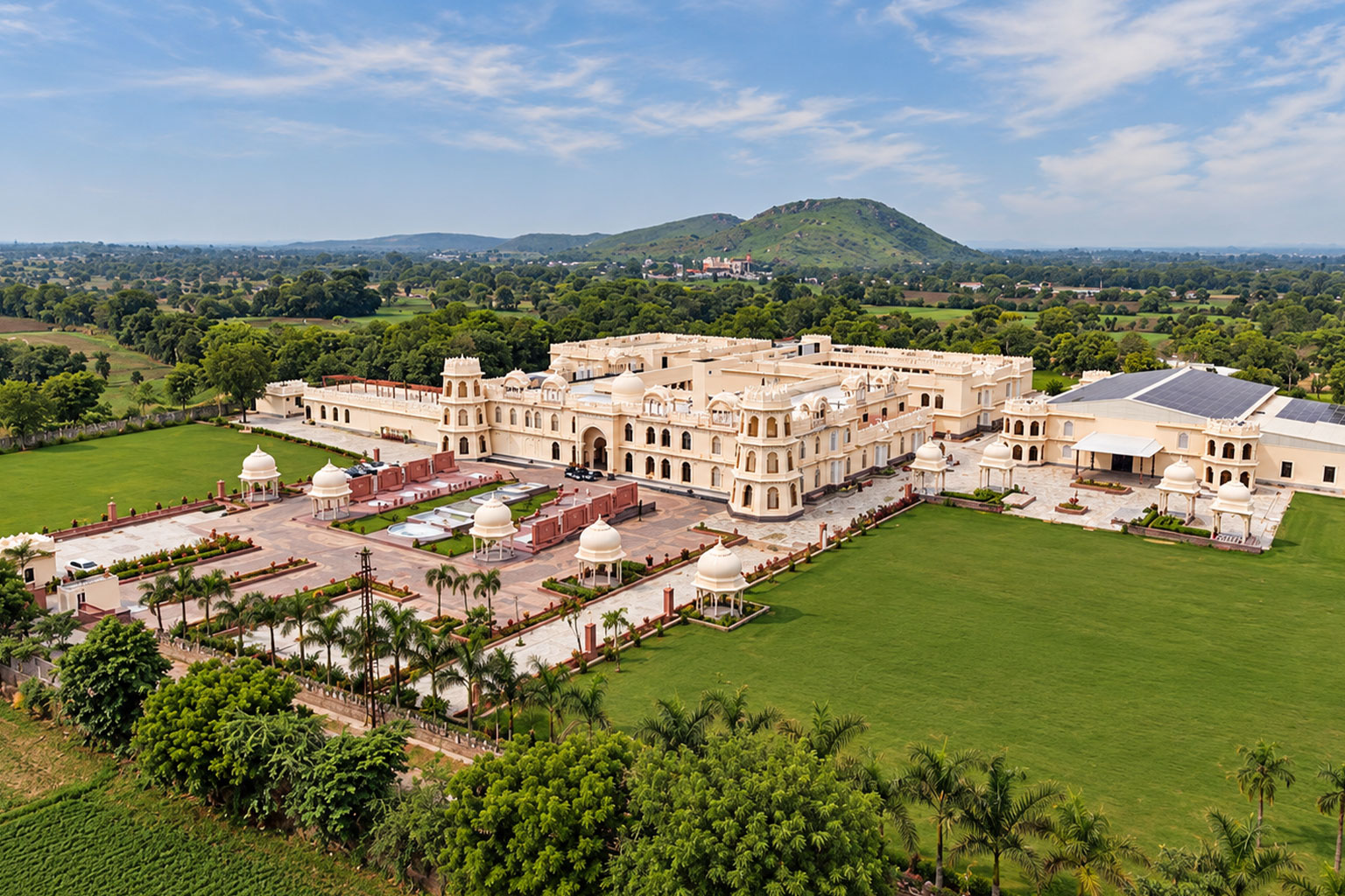 Destination wedding at Kesarbagh Chittorgarh with royal mandap décor and traditional Rajasthani wedding setup