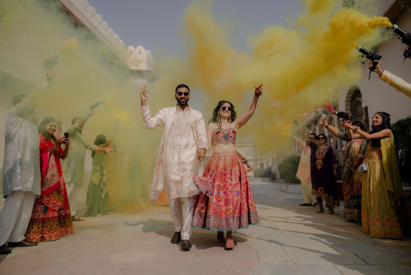 Modern Indian bridal fashion and contemporary groom styling at a Rajasthan wedding